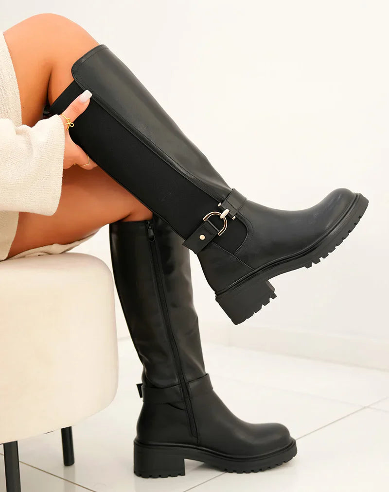 Botas altas negras con banda elástica y detalle dorado